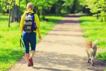 woman and dog on rail trail